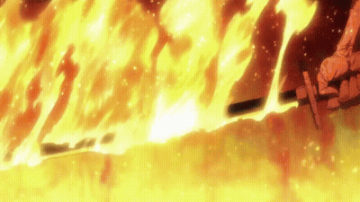 Person Holding Sword By Flaming Wall GIF
