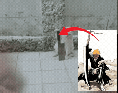 Person Holding Sword Next To Cat GIF