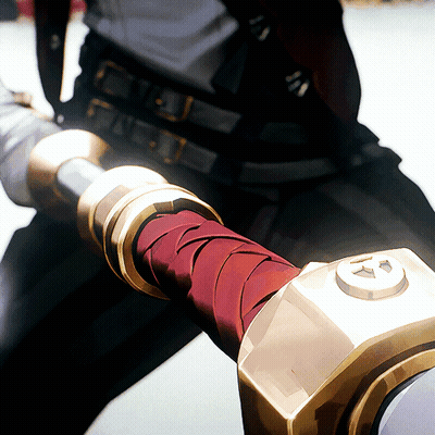 Person Holding Sword With Red And Gold Handle GIF