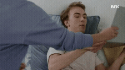 Person Holding Tablet In Front Of Face And Laptop GIF
