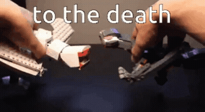 Person Holding Toy Saying To The Death GIF