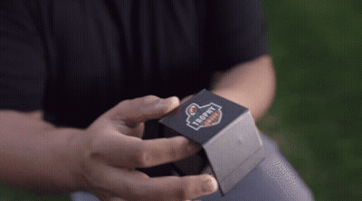 Person Holding Trophy Box GIF