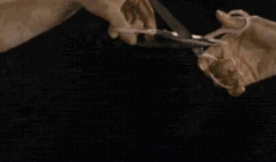 Person Holding Two Tacos Eating GIF