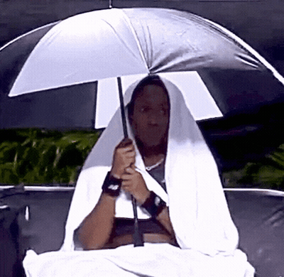 Person Holding White Umbrella With Letter A GIF