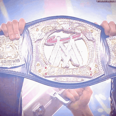Person Holding Wrestling Belt Saying The Big GIF