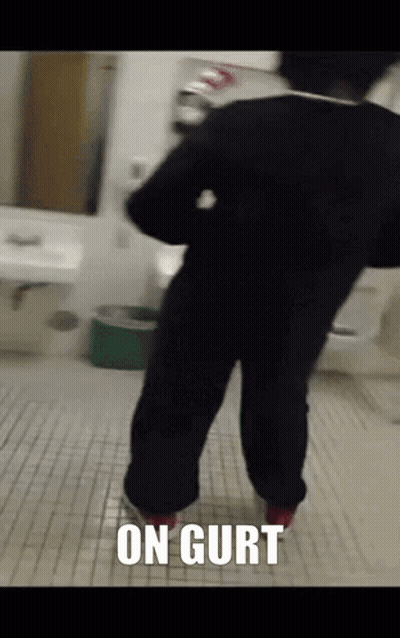 Person In Bathroom With On Gurt On Floor GIF