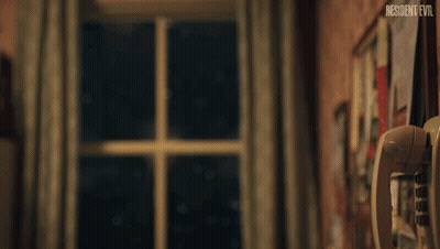 Person In Beanie Talking On Phone Resident Evil GIF