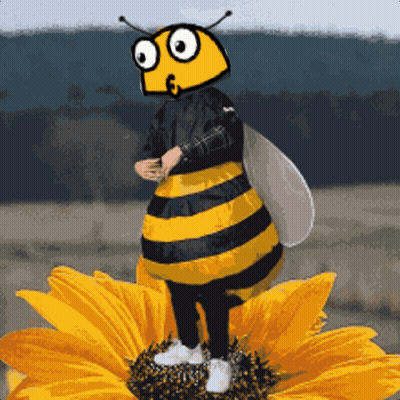 Person In Bee Costume On Sunflower GIF