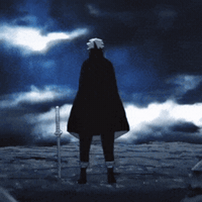 Person In Black Cape Holding Sword GIF