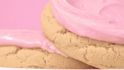 Person In Black Gloves Frosting Cookie GIF