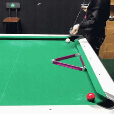 Person In Black Hoodie Talking On Phone GIF