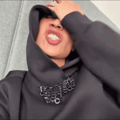 Person In Black Hoodie With Chains GIF