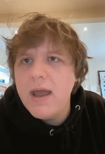 Person In Black Hoodie With Letter C GIF