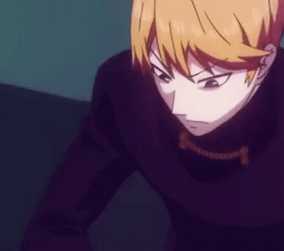 Person In Black Jacket And Necklace In Dark Room GIF