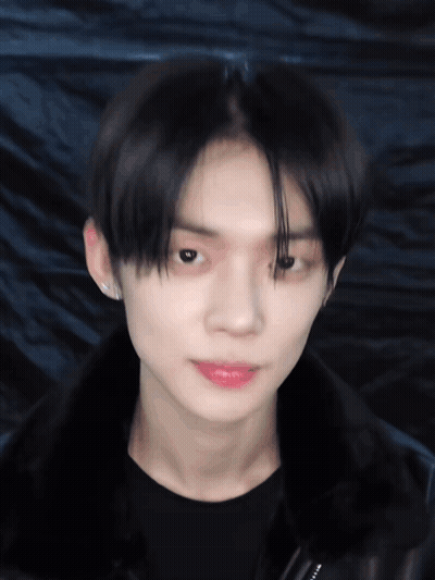 Person In Black Jacket Close Up GIF