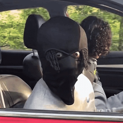 Person In Black Mask Driving Car GIF