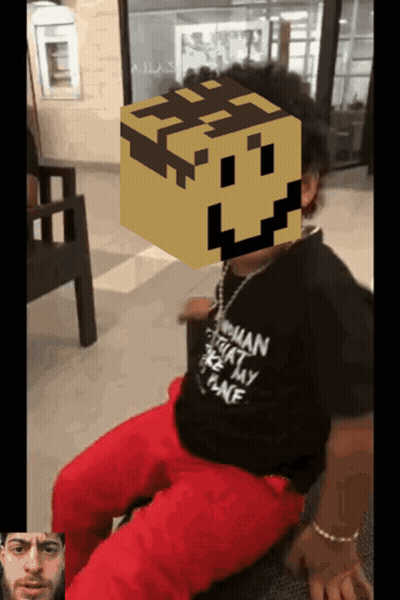 Person In Black Orphan Shirt Sitting GIF