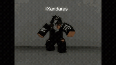 Person In Black Outfit Kneeling GIF