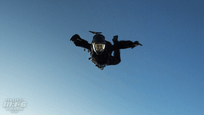 Person In Black Suit Flying Air Force GIF