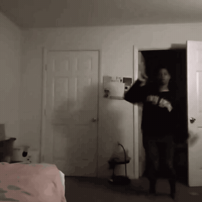 Person In Black Sweater Saying New York GIF