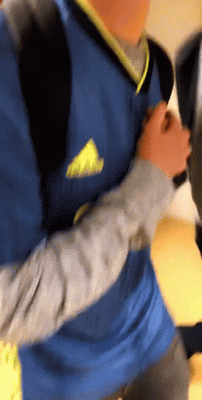 Person In Blue Adidas Shirt Holding Hand GIF