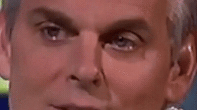 Person In Blue Glove Petting Three Kittens On Blanket GIF
