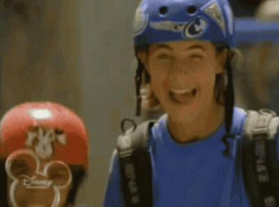 Person In Blue Helmet And Disney Shirt GIF