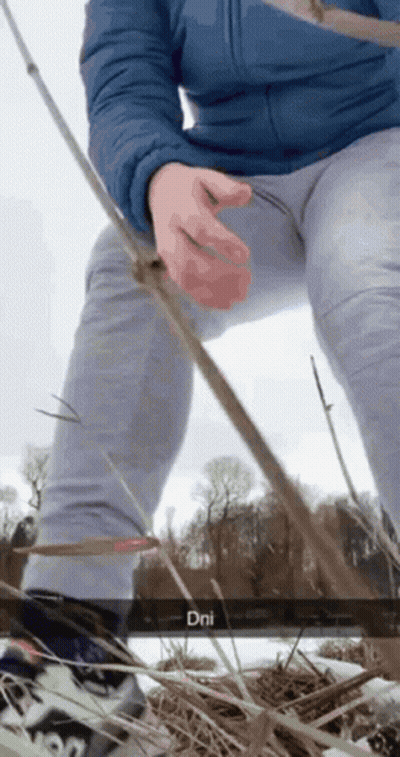 Person In Blue Jacket And Grey Pants Holding Fishing Rod DNI GIF