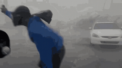 Person In Blue Jacket In Front Of White Honda GIF