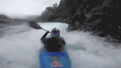 Person In Blue Kayak With Red Bull Logo GIF