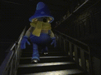 Person In Blue Mushroom Hat And Gloves GIF