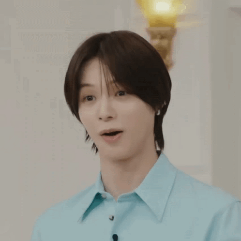 Person In Blue Shirt With Microphone GIF