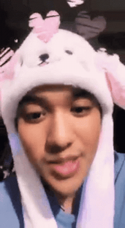Person In Bunny Ear Hat With Heart GIF