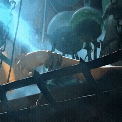 Person In Cage With Blue Light On Arm GIF