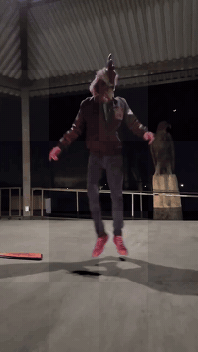 Person In Chicken Mask Jumping GIF