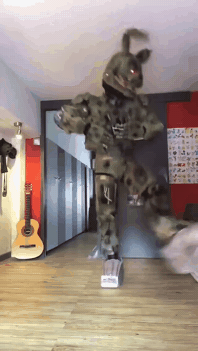 Person In Costume Dancing With Guitar GIF