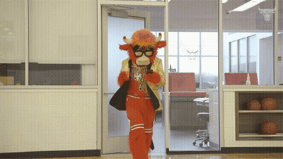Person In Cow Costume Walking Through Door GIF