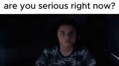 Person In Dark Room Looking At Computer Screen GIF