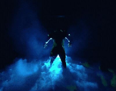 Person In Dark Room With Blue Light GIF