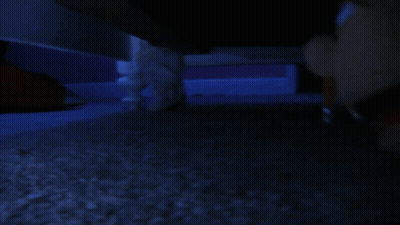 Person In Dark Room With Blue Light GIF