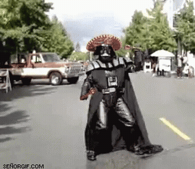 Person In Darth Vader Costume Walking GIF