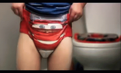 Person In Diaper With Cars GIF
