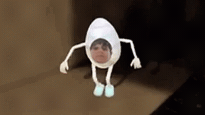 Person In Egg Costume With Face GIF