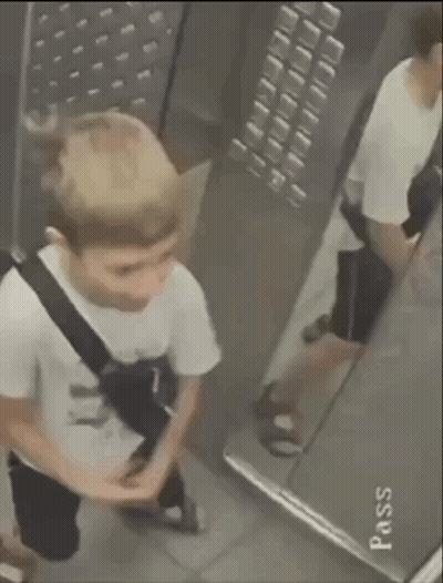 Person In Elevator With Pass GIF