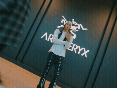 Person In Front Of Army Wall GIF