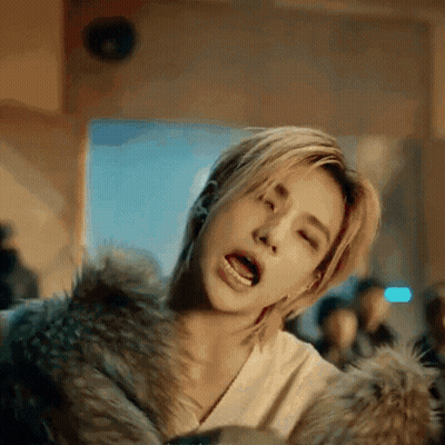 Person In Fur Coat Making Funny Face GIF