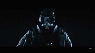 Person In Gas Mask In Dark Room GIF