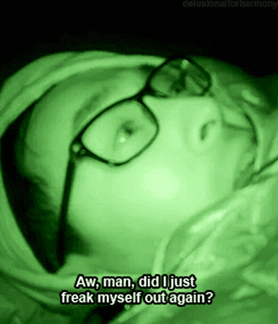 Person In Glasses Laying In Dark Room Saying Aw Man Did I Just Freak Myself Out Again GIF
