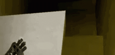 Person In Gloves Holding Paper GIF