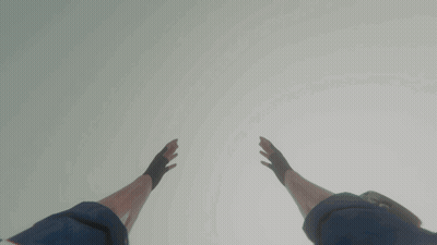 Person In Gloves Reaching Up GIF
